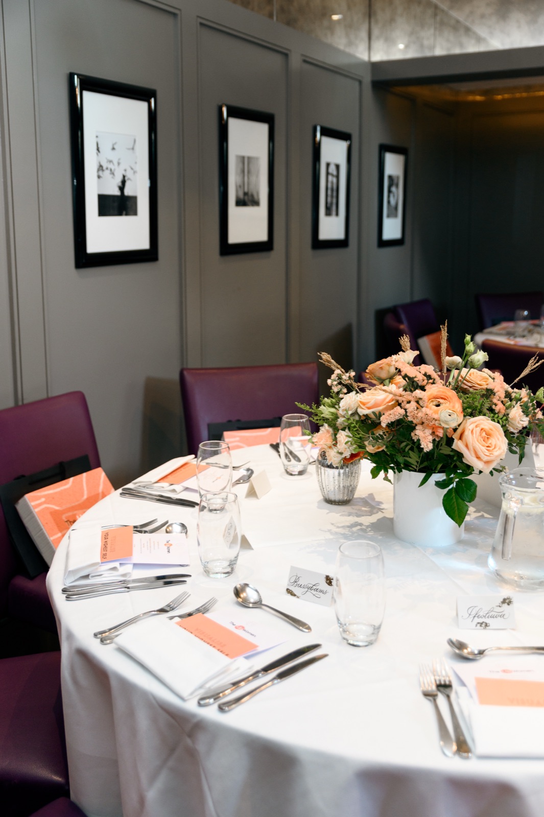An elegantly styled dinner table set for a WellRounded Counsel gathering